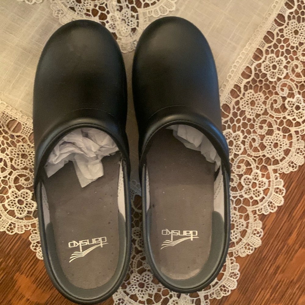Dansko woman’s slip on clogs